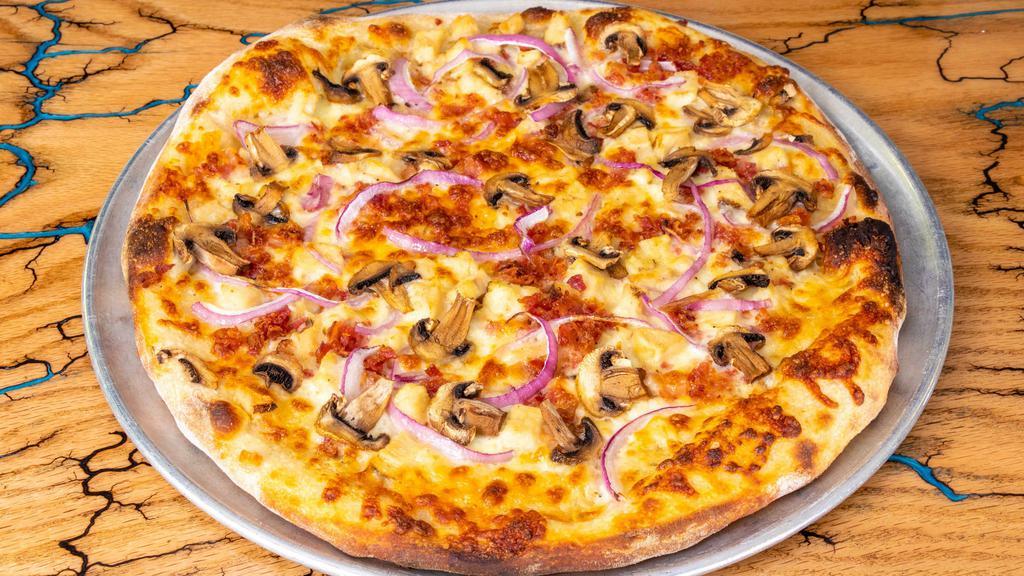 The Blue Bird · In-house garlic sauce, 3 cheese mountain blend, roasted chicken, blue cheese, bacon, red onion, mushroom, served on our sourdough crust.