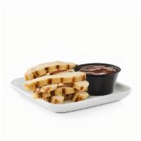 Grilled Chicken Dip'Ns · Bite-sized strips of grilled chicken breast with a side of dipping sauce.
