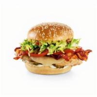California Chicken Burger · House-made guac, hardwood-smoked bacon, Provolone, pickles, lettuce, tomatoes and mayo.