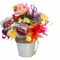 Senorita · Arrangement made with beautiful silk flowers.

Standard 
Tropical colors  8 silk roses, 4 si...