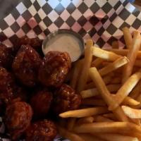 Boneless Chicken Wings (8) · 8 wings served with your choice of homemade potato chips, fries or celery sticks. Ranch dres...