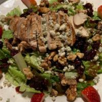 California Chicken Salad · Fire grilled chicken, bleu cheese crumbles, sugared walnuts, fresh strawberries and dried cr...