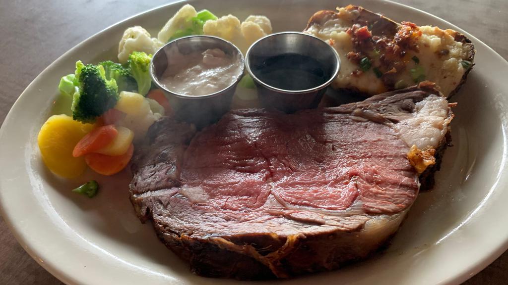 Half Pound Cut · Slow roasted 28-day aged marbled prime rib. Not available before 4pm.