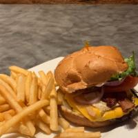 Farm Burger · Bacon, American cheese, tomatoes, crisp lettuce, red onions and mayo topped with a farm fres...