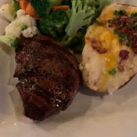Top Sirloin · Served with vegetables and choice of side.