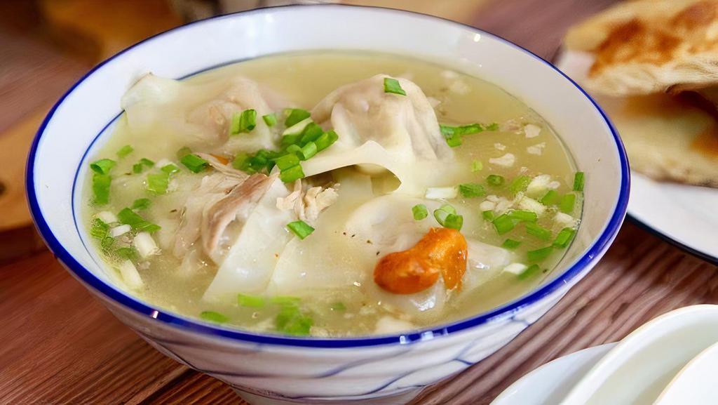 Wonton Soup / 云吞汤 · Handmade. Spiced meat mixture wrapped in wonton with chicken soup.