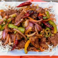 Mongolian Beef · Served spicy. tender sliced beef with bell pepper, onlon, and carrots stir-fried in a spicy ...