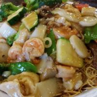 Hong Kong Style Chow Mein · Crispy pan-fried noodle with chicken, beef, shrimp, and veggles topped with light garlic sau...