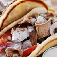 Original Gyro · Soft and warm pita bread, misted in olive oil, wrapped around seasoned beef and lamb mixture...
