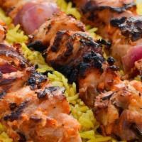 Kabob · With rice. One nine inches wooden skewer of seasoned chicken breast interlaced with fresh re...