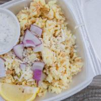 Lemon Rice · Lightly sautéed rice cooked in a seasoned broth with a tangy zip of lemon served with a lemo...