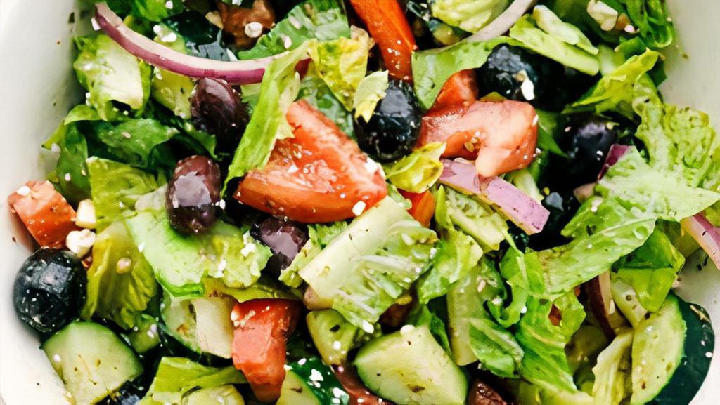 Small Greek Salad  · Romaine lettuce, Roma tomatoes, cucumbers, green peppers, pepperoncini, kalamata olives, and feta cheese. Served with house vinaigrette.'