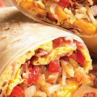 Breakfast Burrito · Your choice of bacon, ham, steak, or sausage, fresh scrambled eggs, cheddar jack cheese, dic...