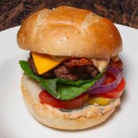 Bacon Burger · 3 slices of apple wood smoked bacon, lettuce, onion, tomatoes, pickles, club sauce, & melted...