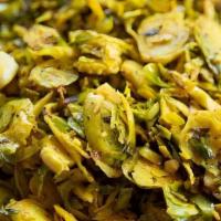 Turmeric Roasted Brussels Sprouts (Gf) · Roasted Brussels Sprouts tossed with hazelnuts (can not be left out) and lemon