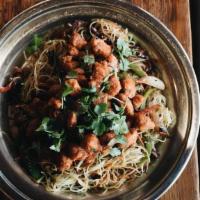 Indo-Chinese Soy Chicken And Noodles Plate (Gf) · Battered and Fried Before the Butcher Chili Garlic Chicken, Rice Noodles, Onions, Bell Peppe...