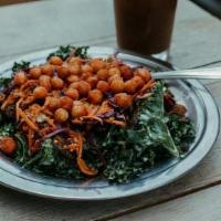 Lg Spicy Eggplant Salad (Gf) · Kale in Tahini topped with Roasted Eggplant, Carrot and Cabbage Slaw and Fried Chickpeas