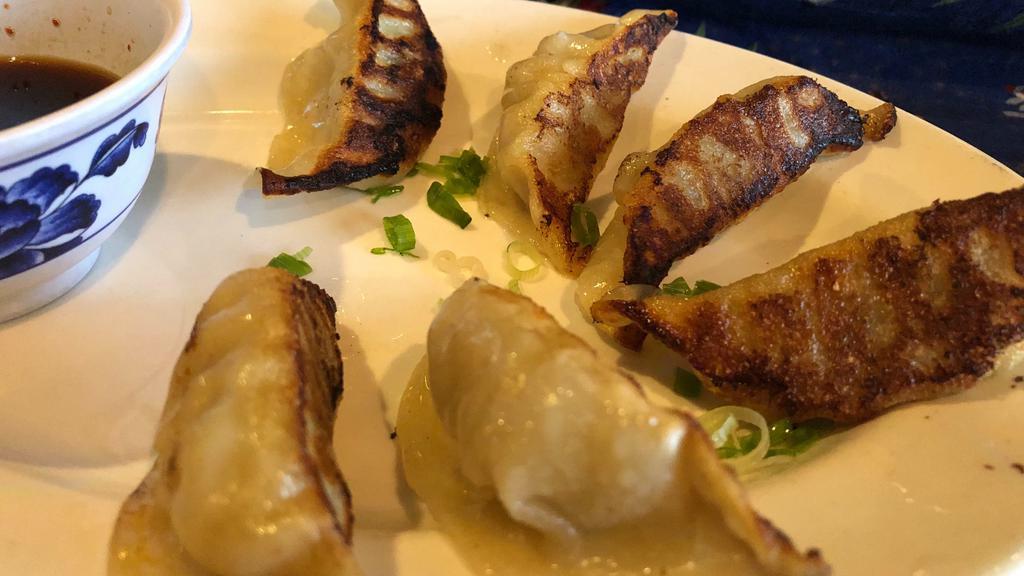 Gyoza Yaki · Popular item. Tender, crisp cabbage and pork dumplings, spiked with ginger, soy sauce and mirin. Served with a chili oil and shoyu dipping sauce.