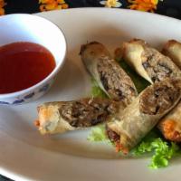 Lumpia Shanghai · Thin crisp Filipino style egg rolls filled with shrimp, pork and black fungus. Served with a...