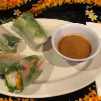 Fresh Veggie Spring Roll · Two rice flour wraps filled with somen noodles, shredded carrots, cilantro and lettuce serve...