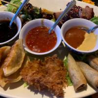 Pupu Platter (Assortment) · Our fearless leaders favorite assortment of pupu's and robatas. Includes coconut prawns, gyo...