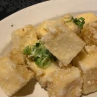 Agedashi Tofu · Lightly breaded tofu served with bonito flakes and tempura sauce.