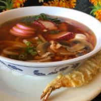 Nabeyaki Udon · Udon noodles served in the traditional style with mushrooms, spinach, fishcake, our homemade...