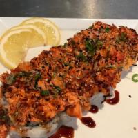 Half Baked Roll · California roll topped with baked fish with spicy mayo, masago, unagi sauce and green onions...