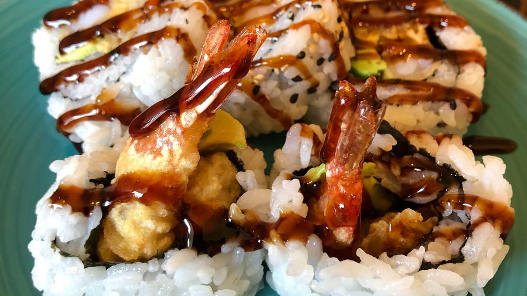 Da Kine Roll · Tempura shrimp, avocado with eel sauce.

Roll is COOKED