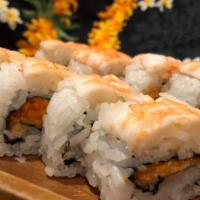 Super Crunchy Roll · Choice of spicy tuna or salmon topped with shrimp.