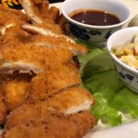 Chicken Katsu · Tender chicken thigh fillets lightly battered then coated in panko breadcrumbs and fried to ...