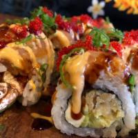 Volcano Roll · Tempura shrimp, cream cheese, cucumber and avocado, topped with spicy tuna, eel sauce, spicy...