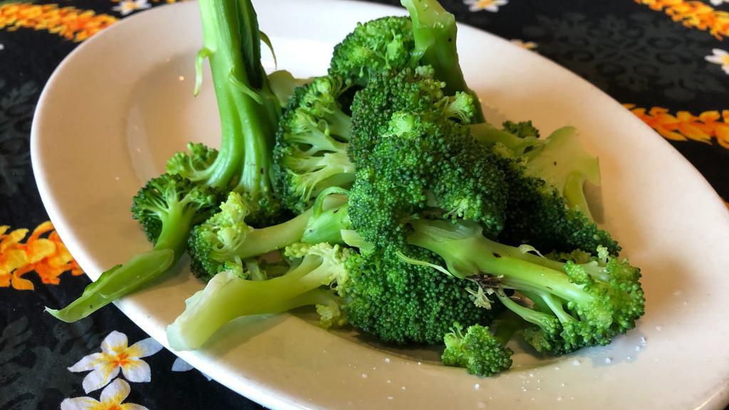Steamed Broccoli · Steamed Broccoli served with a light dusting of kosher salt.