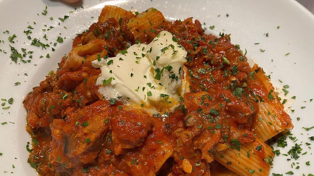 Rigatoni With Meat Sauce · rigatoni pasta in our house meat and mushroom sauce garnished with mascarpone cheese (served on the side)