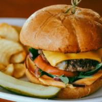 Cheeseburger · 6 oz Patty with Choice of Cheddar, Pepper Jack, Bleu Cheese, Swiss or Vegan Cheese.   Served...