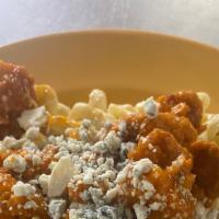 Buffalo Mac & Cheese · Add a little spice with crispy chicken smothered in buffalo sauce and finished with blue che...