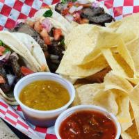 Street Tacos · Choice of grilled chicken or steak. 3 traditional com tortilla tacos topped with pico De gal...