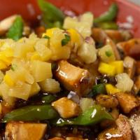 Teriyaki Rice Bowl · Grilled chicken and green peppers topped with pineapple salsa and teriyaki over rice.