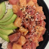 Home Poke Bowl · Fresh salmon , fresh tuna , mango over  rice with house marinade , special sauce , cucumber ...