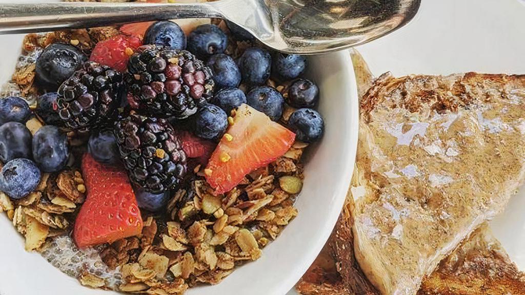 Overnight Chia Pudding · non-dairy chia pudding, agave nectar, berries & bee pollen with house-made pepita granola. served with whole grain toast, almond butter & sea salt (v)