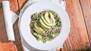 Southwest Chopped Salad · mixed greens, avocado, dried corn, israeli couscous, red onion & pepitas with buttermilk her...