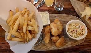 Kibbeling (Fish & Chips) · beer battered cod with traditional Dutch seasoning, tartar sauce, coleslaw & fries