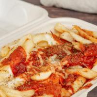 Pizza Fries · Fries topped with marina sauce, mozzarella cheese, pepperoni, and basil.