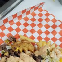 Loaded Burger Fries · Waffle cut fries, 1/3 pound fresh never frozen chopped beef patty, American cheese, chopped ...