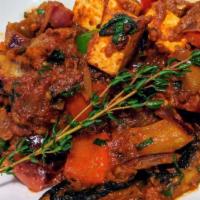 Tofu Portabella Kadhai · Portobello Mushrooms, Tofu, Ginger, Coriander Seeds, Onions, Peppers