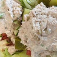 Tuna Salad Platter · A hefty scoop of homemade tuna salad on a bed of lettuce with tomatoes, hardboiled egg, cucu...