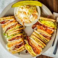 Egg Connection Club Sandwich · With turkey bacon lettuce tomato american cheese and mayonnaise.