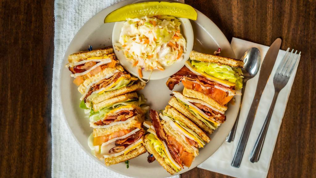 Egg Connection Club Sandwich · With turkey bacon lettuce tomato american cheese and mayonnaise.