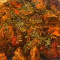 Mixed Grill · A brilliant combination of Tandoori Chicken, Chicken Tikka, mal mal kabab & Jumbo Shrimp.