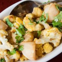 Aloo Gobi Masala · Cauliflower & potatoes cooked with a choice of Indian spices.